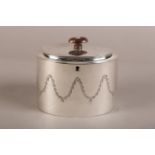 A GEORGE III SILVER TEA CADDY, Abstinando King, London 1800 of oval outline with disc cover and