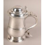 A GEORGE III SILVER TANKARD, probably Joseph Steward, London 1767 having a domed cover with