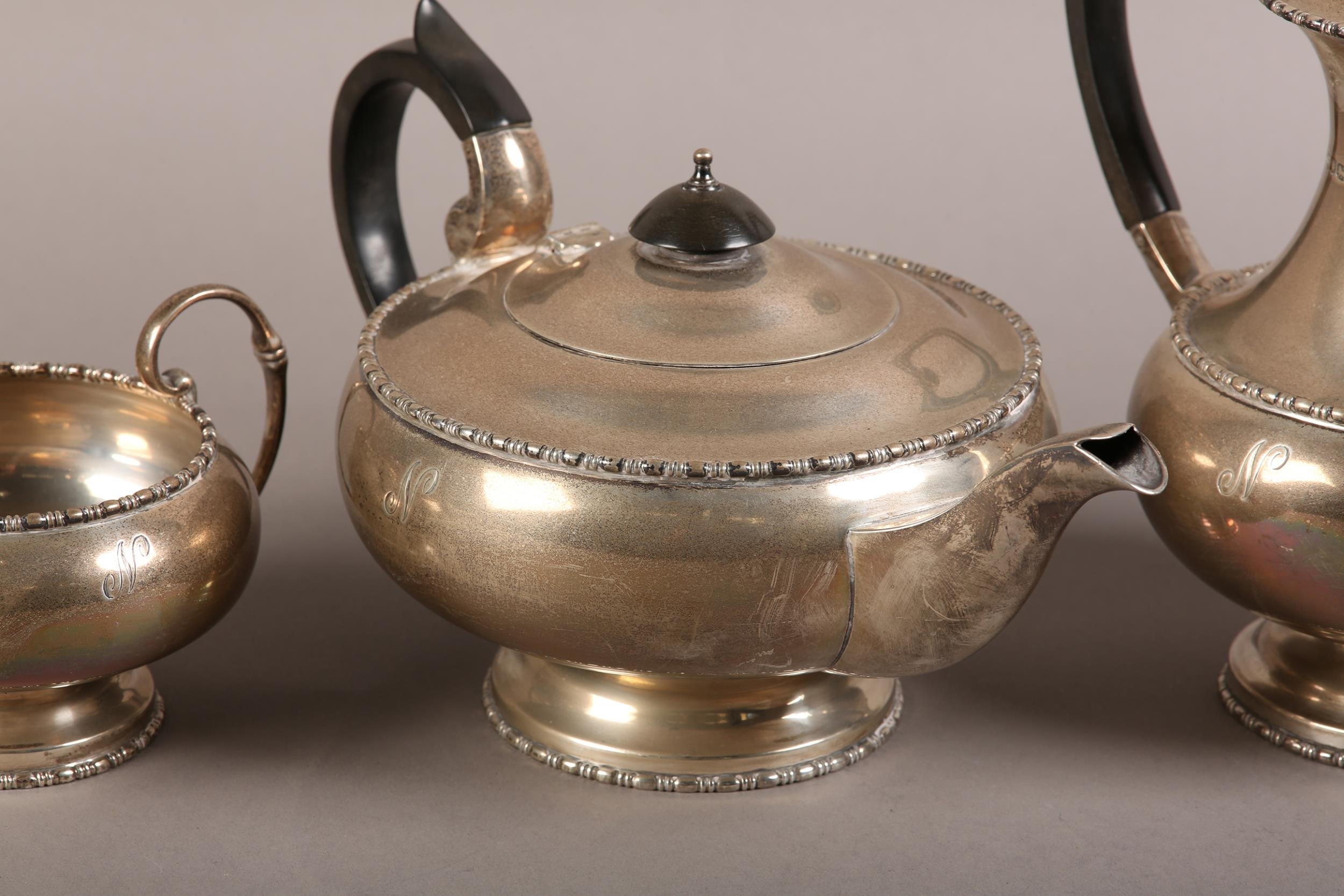 A GEORGE V FOUR PIECE SILVER TEA SERVICE, Walker & Hall, Sheffield 1934, comprising teapot, hot - Image 2 of 5