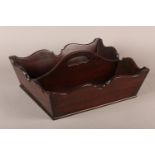 A GEORGE III MAHOGANY CUTLERY TRAY of two divisions, central finger grip and bracketed rims, 35cm