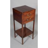 AN EARLY 19TH CENTURY MAHOGANY WASH STAND having twin open top, the interior with apertures for bowl
