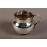 A CHARLES II SILVER MUG, London 1684, maker's mark '*R', having a reeded band to the neck, strap