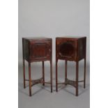 A PAIR OF EARLY 19TH MAHOGANY POT CUPBOARDS, each with an indented panel door, brass loop handle, on