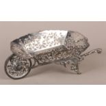 AN EDWARD VII SILVER BONBON WHEELBARROW, George, Nathan and Ridley Hayes, Chester 1907, pierced in a