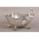 A GEORGE V SILVER DISH, William Hutton, Sheffield 1912, of boat shape with pierced panels and