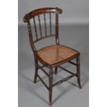 AN EARLY VICTORIAN FAUX ROSEWOOD SINGLE CHAIR, the bar back with carved fluted ears above slender