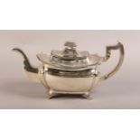 AN EARLY 19TH CENTURY IRISH SILVER TEAPOT, Richard Sawyer, London 1814, of oblong outline, the
