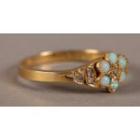 A VICTORIAN OPAL AND DIAMOND CLUSTER RING IN 18CT GOLD, the circular cabochon opals collet set