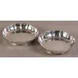 A PAIR OF GEORGE V SILVER STRAWBERRY DISHES, Harry Freeman, London 1919, of circular panelled
