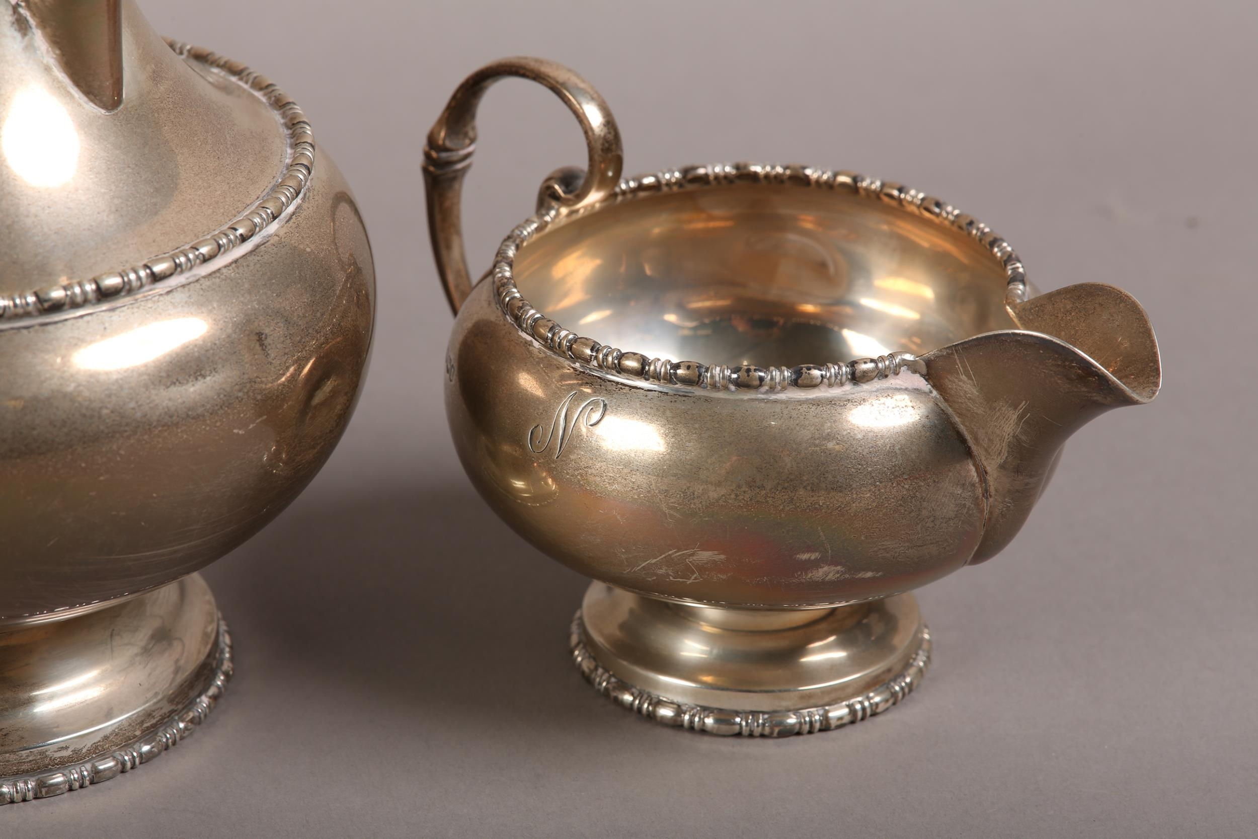 A GEORGE V FOUR PIECE SILVER TEA SERVICE, Walker & Hall, Sheffield 1934, comprising teapot, hot - Image 4 of 5