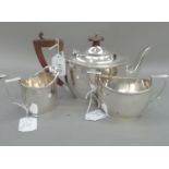 A George V three piece silver tea service Birmingham 1926, oval outline with reeded border and