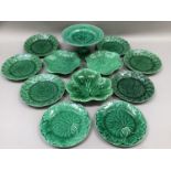 A collection of 19th century Wedgwood and other leaf moulded dessert ware in green glaze