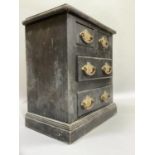 A Victorian ebonised specimen chest of two short and two long drawers containing fossil specimens