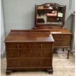 A 1920s mahogany dressing table and chest of drawers, the dressing table having a bevelled glass