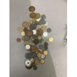 Approximately 130g of miscellaneous foreign silver coins plus a bag of other foreign coins