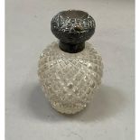 An Edward VII silver lidded cut glass scent bottle, Birmingham 1903, 12.5cm high