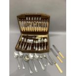 An oak canteen of mixed silver plate cutlery