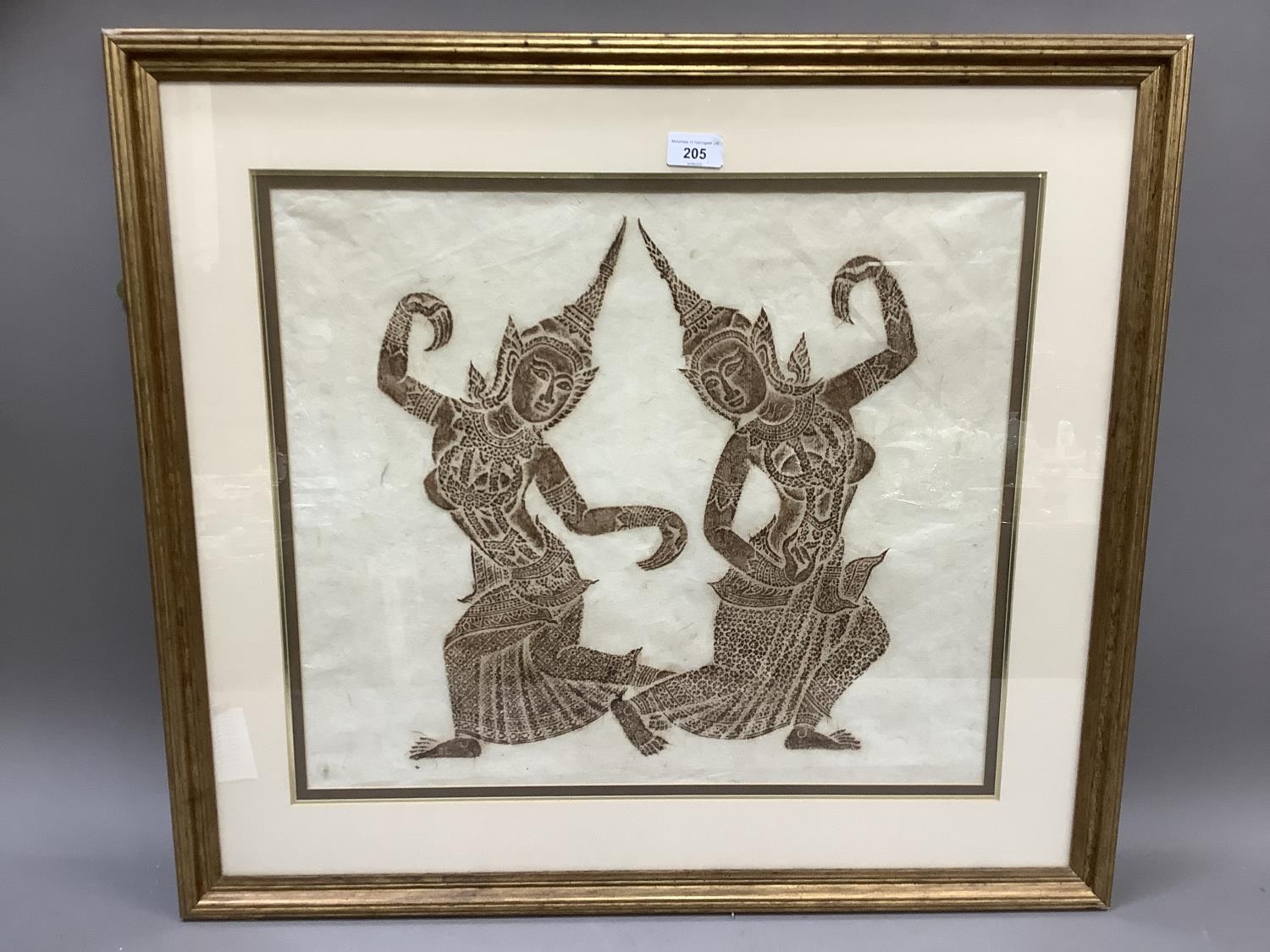 A brass rubbing of two Thai dancers, 46cm x 54cm approx