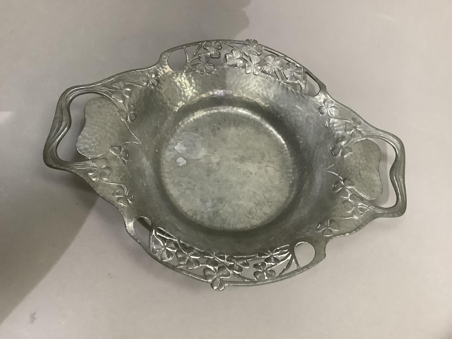 A Tudric pewter two handled dish numbered 0287, the rim pierced with shamrock, 28cm over handles x - Image 3 of 3