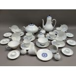A Rosenthal china part service, lace moulded white body, some pieces picked out in blue comprising