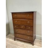 A Stag Minstrel chest of two graduated drawers, three short drawers and two further drawers below,