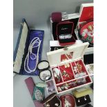 A quantity of costume jewellery including rings, necklaces, brooches and bracelets together with