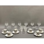 A set of four cut glass water glasses, six sherry or port glasses and six wine glasses by