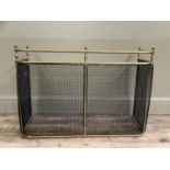A Victorian style brass rimmed and wire mesh fire guard, 83cm wide