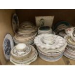 A large collection of decorative plates and teaware, feeding cup, comports, ribbon plate, silver