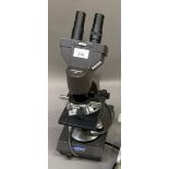 A Collegiate 400 microscope with four lenses