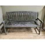 A teak garden bench by Carnock Gates, 150cm wide