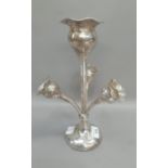 A George V silver epergne of four flutes each with wavy rim issuing from a circular domed base,