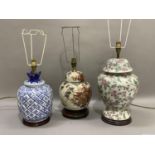 Three various table lamps of trailing pink flowers, Chinoiserie design and blue and white
