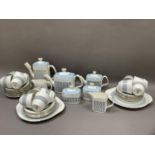 A Royal Doulton Counterpoint tea and coffee service comprising large and small teapots, coffee