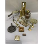 A brass shell vase, Victorian brass trivet, spill vase, postal scales and weights, candlesticks,