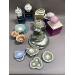 A collection of Wedgwood Jasper ware in green and blue including a teapot, cups and saucers, trinket