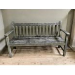 A teak garden bench, 152cm (repair to slats)