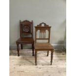 Two Victorian hall chairs in walnut and oak