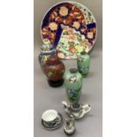 An Imari circular plaque together with a cloisonné ginger jar and pair of vase (at fault) and an