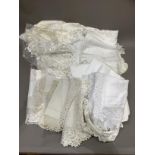 A quantity of Victorian and later linen with lace and crochet trims including pyjama cases,
