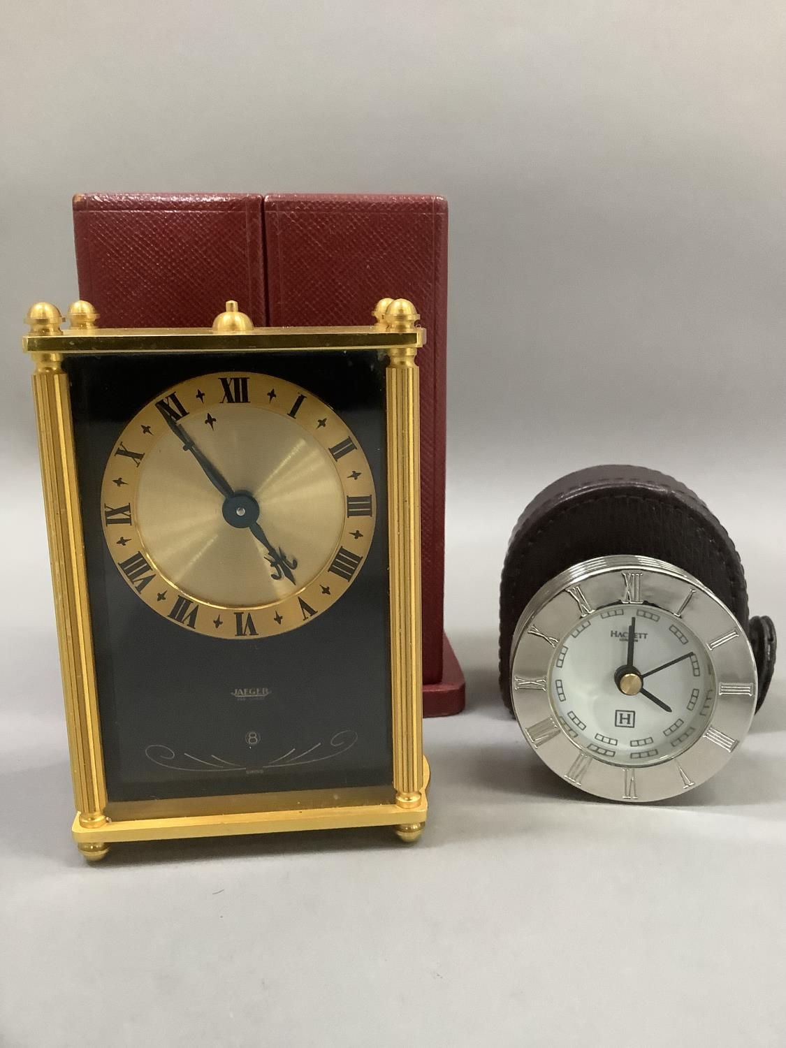 A Jaeger boudoir clock having a black face with gilt metal chaptering and black Roman numerals, - Image 2 of 3