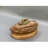 A French pottery game dish and cover modelled as a hares head and pastry pie shaped body, 20cm by