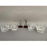 A set of six whisky tumblers, each engraved with a golfer in a different pose, two Cameron