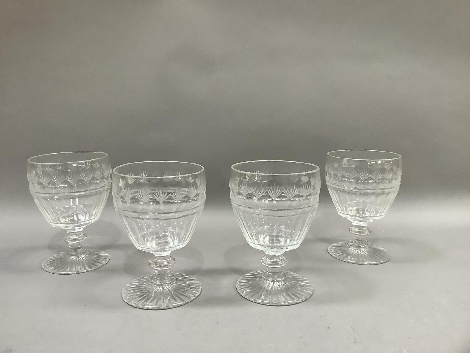 A set of four 19th century wine goblets, the panel cut bodies having a border, fan cut and octagonal