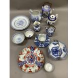 A quantity of blue and white English and Chinese pottery together with an Imari plate