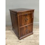 A mahogany finished filing cabinet chest with pull out slide, 50cm wide by 67cm deep by79cm high