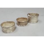 Three various Victorian and later napkin rings, Birmingham 1898, 1906 and 1927