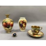 A Royal Worcester fruit painted vase signed Ricketts, ovoid, painted with peaches and