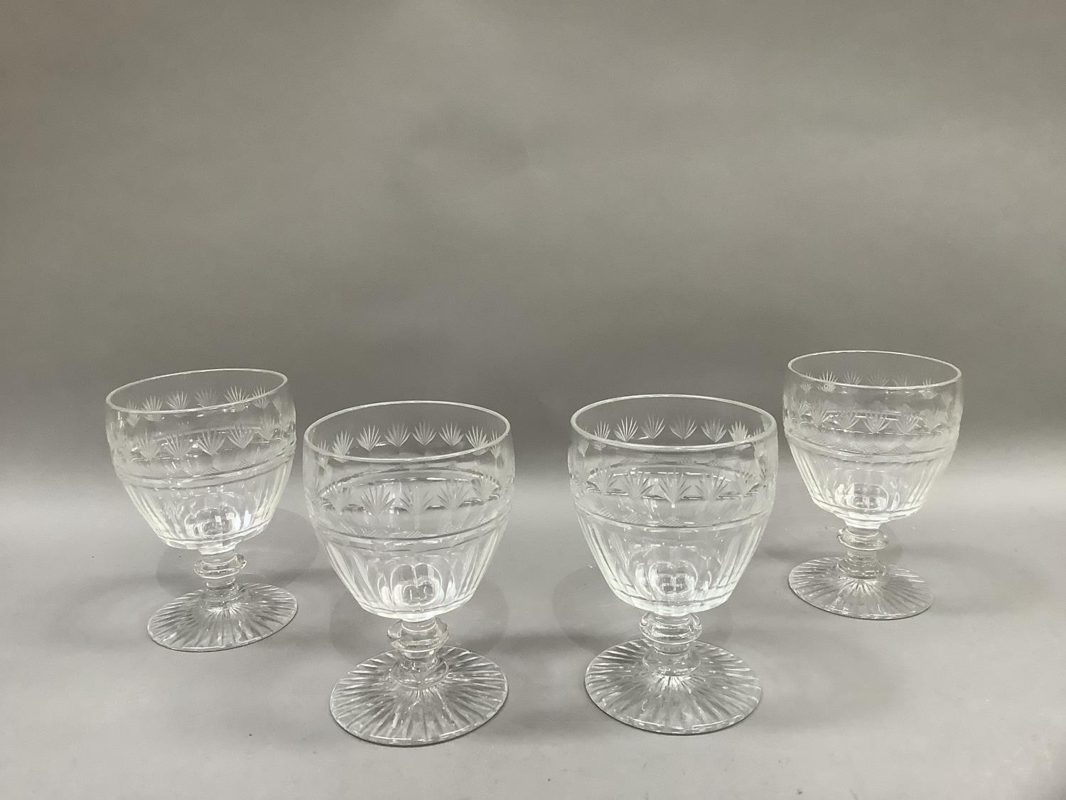 A set of four 19th century wine goblets, the panel cut bodies having a border, fan cut and octagonal - Image 2 of 2