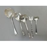 A pair of modern silver sifting spoons, .925 standard, a George V sifting spoon, London 1933, a